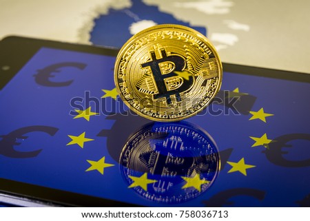 Financial concept with golden Bitcoin over smartphone, with EU flag and euro symbol. MiCA Directive of Bitcoin and other cryptocurrencies in European Union concept. Mica Regulation Royalty-Free Stock Photo #758036713