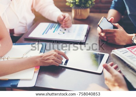 Business team discusses marketing plans or strategic plans in the meeting room. Royalty-Free Stock Photo #758040853