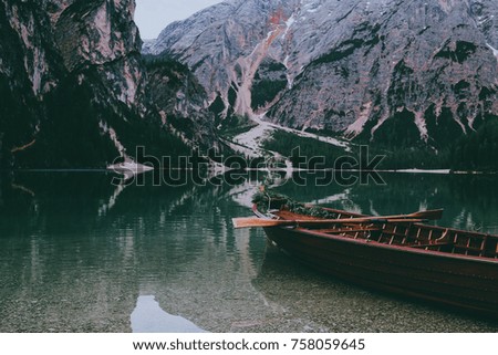 boat on Lake Brides Italy Alps