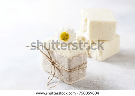 Natural handmade soap with chamomile, the concept of spa and health. Selective focus