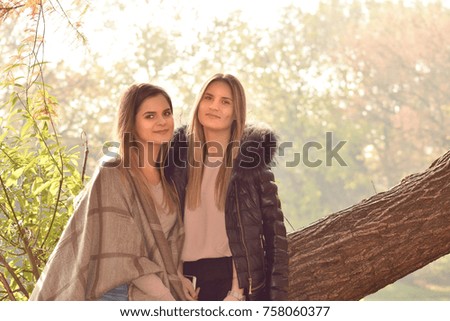 Two happy woman friends