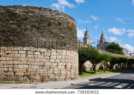 The Roman walll and the towers of the cathedral of Lugo in Galicia, Spain Royalty-Free Stock Photo #758103652