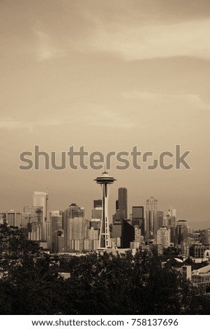 Seattle city skyline at sunset with urban office buildings viewed from Kerry Park.