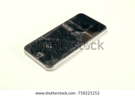 Broken glass screen of mobile phone isolated. Smartphone drop to the floor. Crash of protect glass.