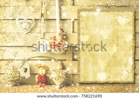 Background for writing the Christmas menu put  photo or greetings, empty frame, vintage cooking utensils, Santa Claus, snowman and reindeer vintage decoration in rustic kitchen