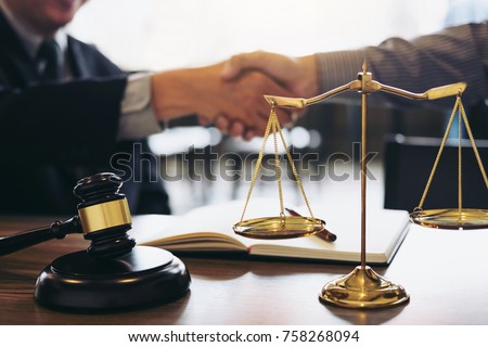 Handshake after good cooperation, Consultation between a male lawyer and businessman customer, tax and the company of real estate concept. Royalty-Free Stock Photo #758268094