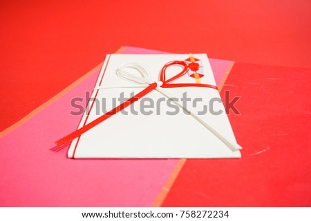 The Japanese bag which hands a celebrate gift of money. red background
