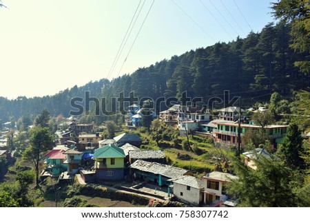 Beautiful aerial view of Dharamshala, Mcleodganj city of Himachal Pradesh, India. Beautiful great and grand Himalayas. Perfect destination for holidays and traveling in summers as well as winters. 