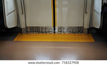 Doors of city train close for safety,