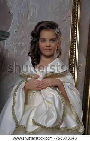 young princess in white dress. photo in retro style