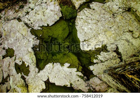 Abstract picture of water in a large stone.