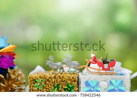 Miniature people: Colorful Christmas characters and decorations. Using as background or wallpaper holiday, new year, Christmas concept.