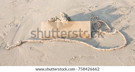 Old wood board with sea sand beach background