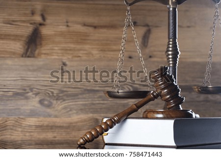 Legal office concept. Law symbols composition on wooden background. Place for text.

