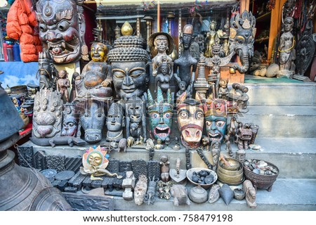 Colorful Tradition wooden masks and handicrafts on sale at shop in the Thamel District of Kathmandu, Nepal.