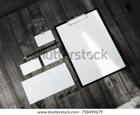 Blank stationery set on on wooden table background. Template for branding identity. For graphic designers portfolios. Top view.
