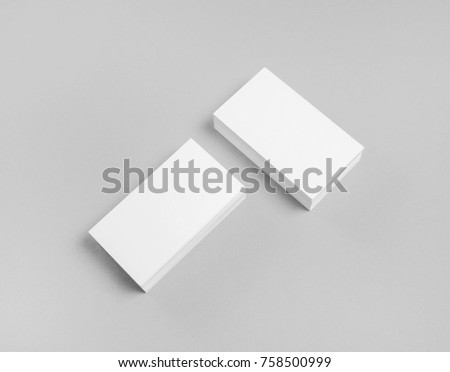 Photo of blank business cards on paper background. Template for ID. Mock-up for branding identity. Top view.
