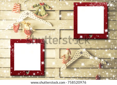 Christmas photo frames cards, two empty picture frame hanging on a rustic wall and cute hangers, Santa Claus rag doll and xmas decoration.