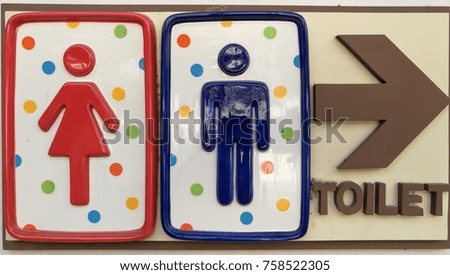 Ceramic Rest room or Toilet or Wash room Sign on Polka dot background 