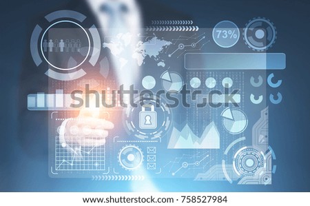 Businessman pointing at an abstract futuristic HUD and graphs hologram against a blurred blue background. Toned image double exposure mock up Elements of this image furnished by NASA