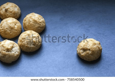 Fresh homemade cookies on a dark blue background