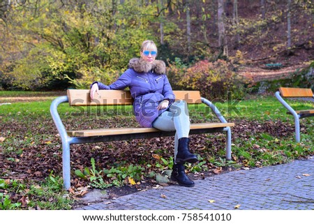Blonde girl in the park