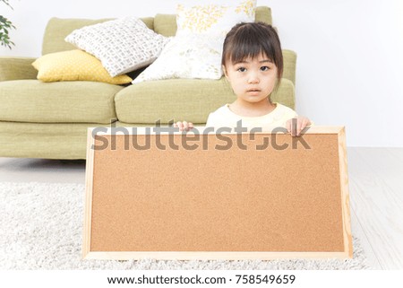 Crying child having a board