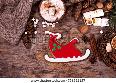 Christmas cookies. Christmas cookies with festive decoration.  Smiling gingerbread men.  New Year's, Christmas decorations, gifts, Christmas atmosphere.