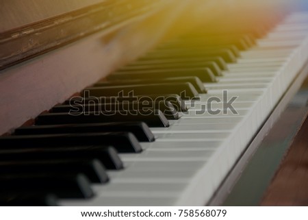 Beautiful classic piano with sunlight