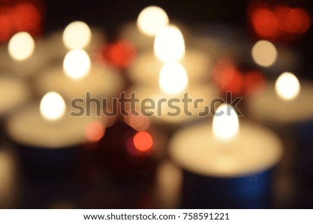 christmas time,blurred picture from light of candle