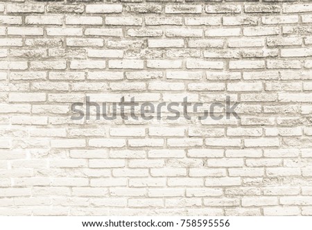 Old black and white brick wall texture background / flooring interior rock stone pattern clean concrete grid uneven bricks design stack.