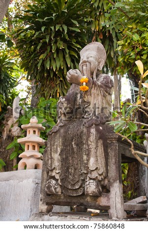 Chinese style statue in the garden in temple