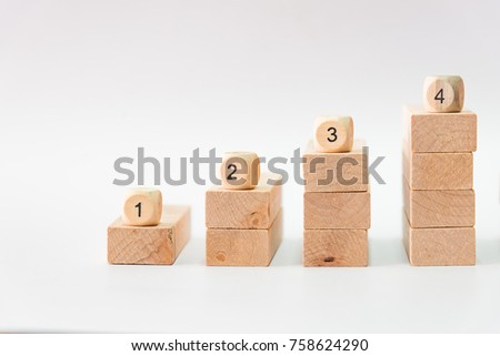 Wood block stacking as step up stair with sequence number. Business concept for growth success process or building concept. Royalty-Free Stock Photo #758624290