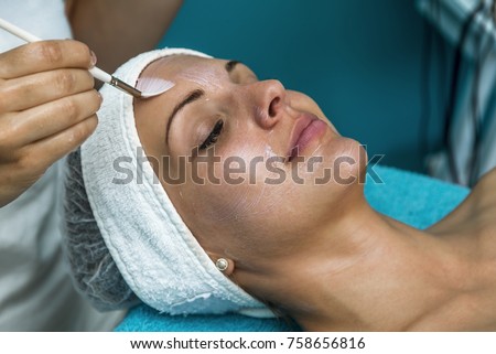 Caucasian woman relaxing in a spa bed and enjoying the treatment. Royalty-Free Stock Photo #758656816