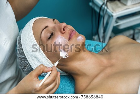 Caucasian woman relaxing in a spa bed and enjoying the treatment. Royalty-Free Stock Photo #758656840