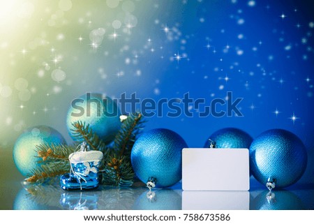 beautiful new year toys on an abstract blue background