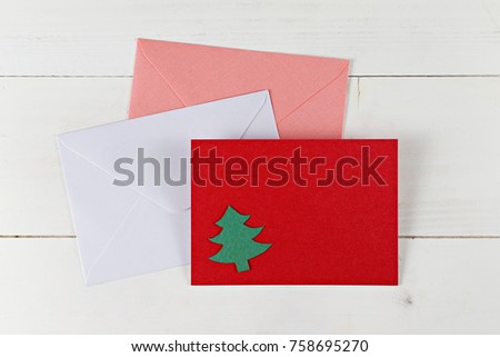 Envelope and greeting card on desk, Festive season background