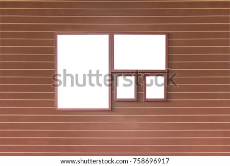 Brown wooden wall with blank frame