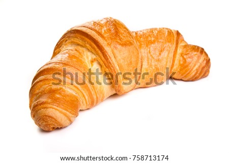 Plain croissant on white background Royalty-Free Stock Photo #758713174
