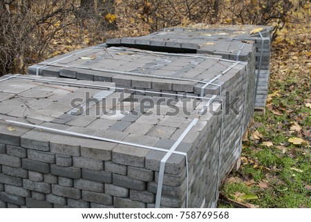Stack of paving stones during construction road