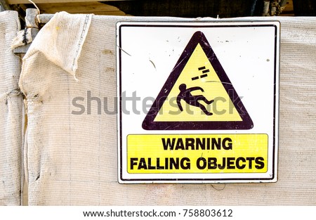 warning falling objects sign at a construction site