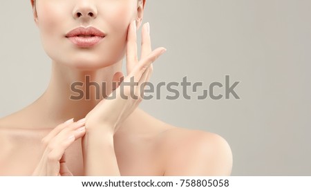 Beautiful young woman with clean fresh skin  .Girl  beauty face care. Facial  treatment   . Royalty-Free Stock Photo #758805058