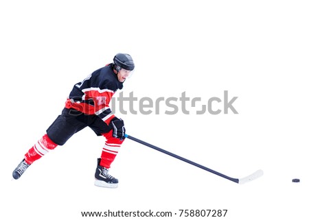 Ice hockey skater in attack isolated on white background