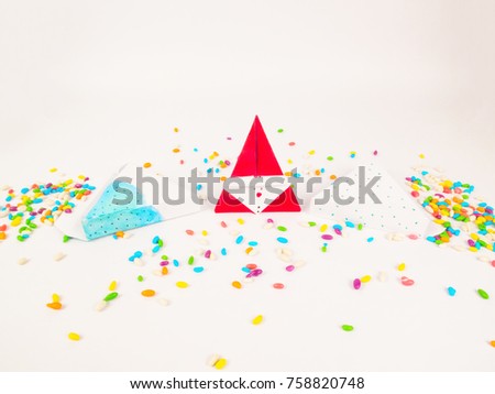 Christmas decoration triangle git boxes with colorful candy  as confetti for celebration best Christmas holidays background image for invitation