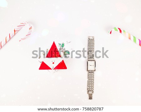 Christmas decoration with square gift boxes with men silver watch and candy canes for celebration best Christmas holidays background image for invitation