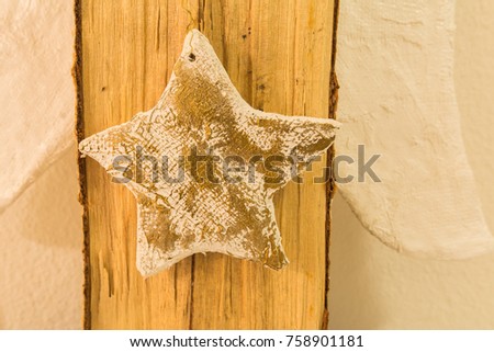 Christmas decoration with star on wooden background