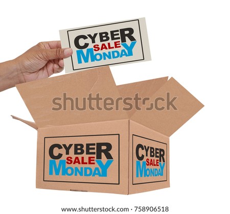 Hand placing Cyber Monday Sale  sign in opened cardboard box white background
