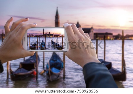 First person perspective point of view hands holding smartphone capturing footage of holiday travels in europe 