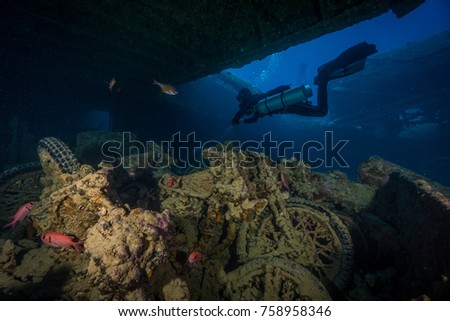 Motorcycles in the Thistlegorm wreck cargo hold. Northern Red Sea.  Royalty-Free Stock Photo #758958346
