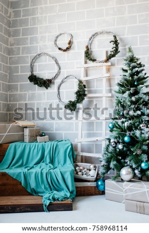 interior with decorated cristmas tree and presents close up photo